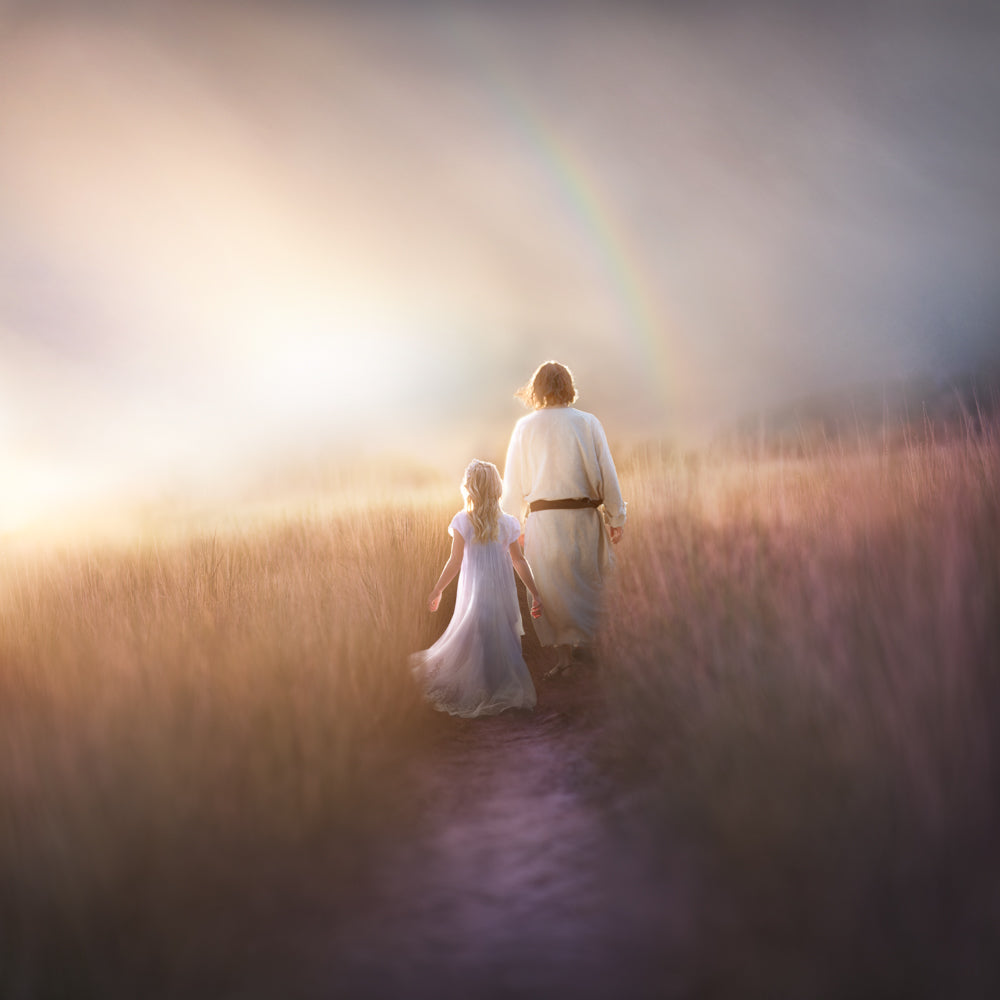 A young girl following Jesus in a field.