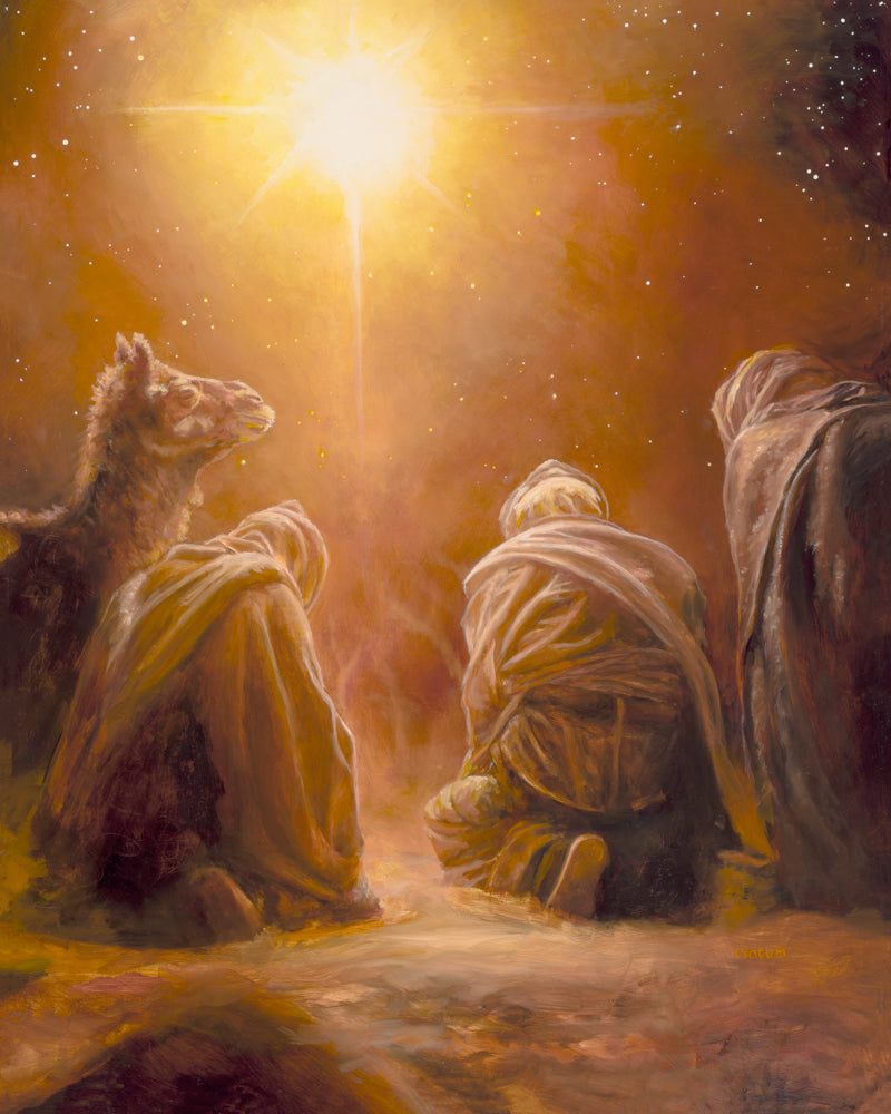 The three kings and a camel kneeling before a bright star.