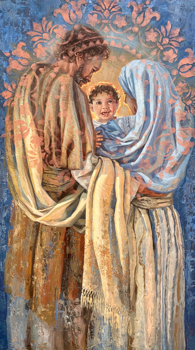Baby Jesus in the arms of Mary and Joseph.