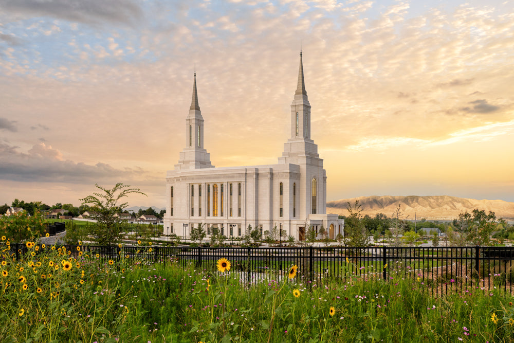 The Lindon Utah Temple with a golden sky.