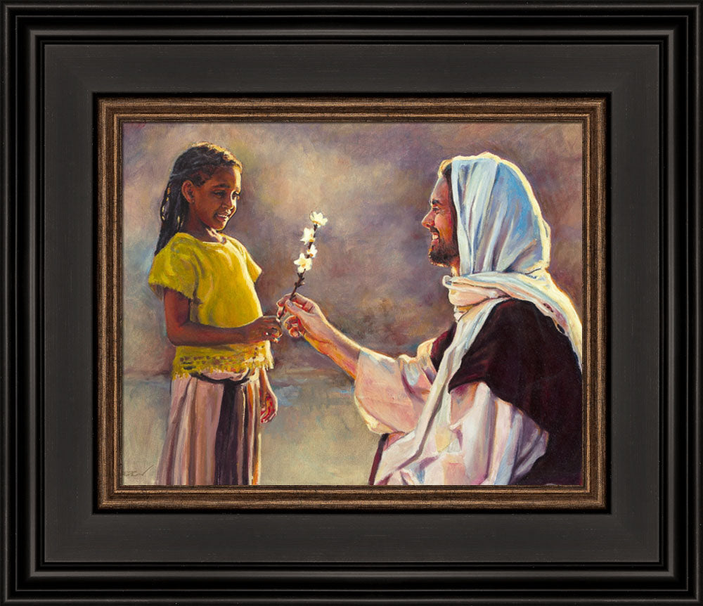 A little girl handing a flower to Jesus.