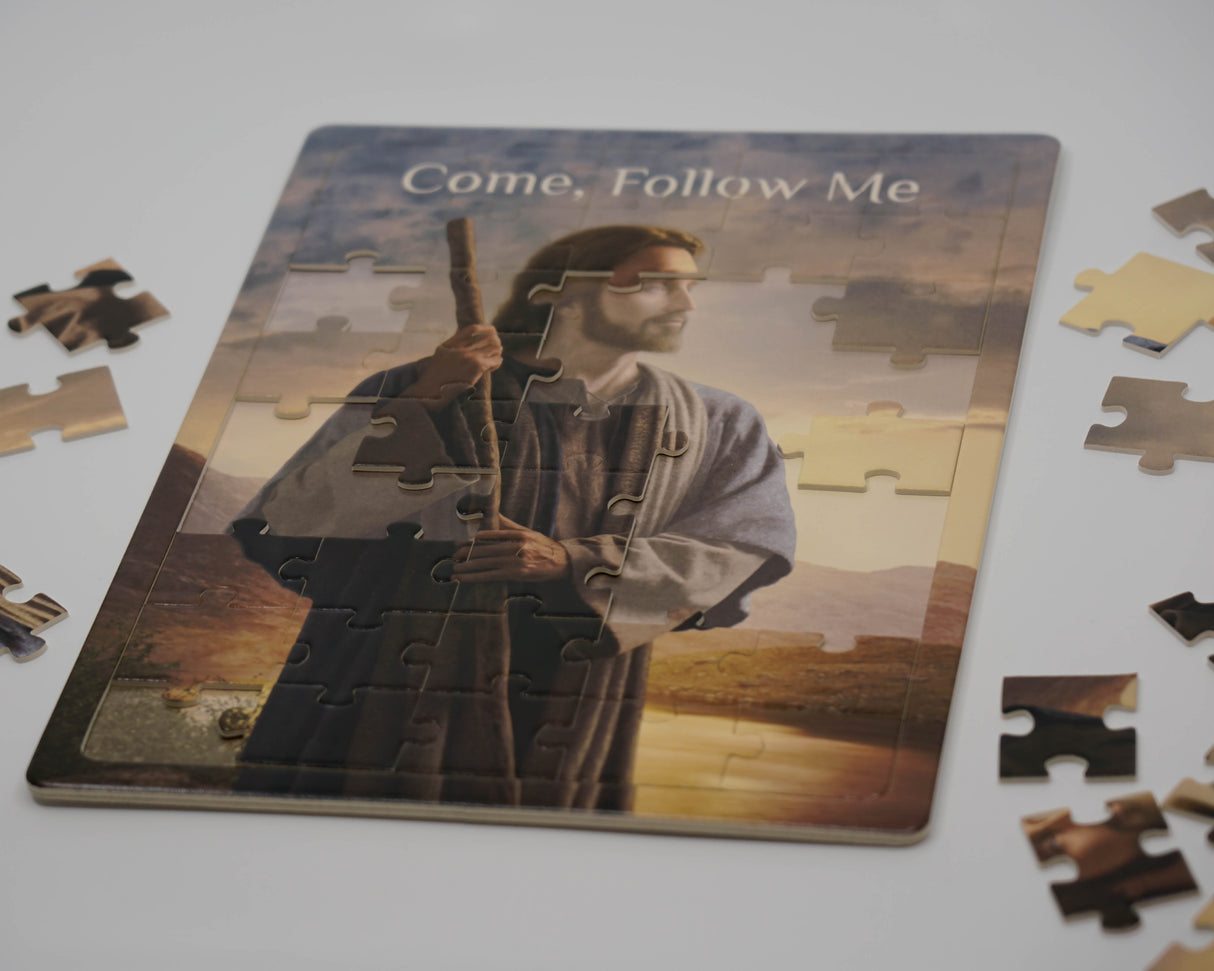 A colorful puzzle titled "Light of Hope" featuring the phrase "Come Follow Me" in an engaging design.