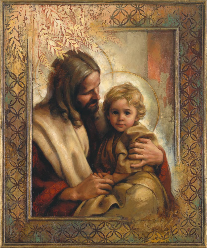 Jesus holding a young child on his lap.