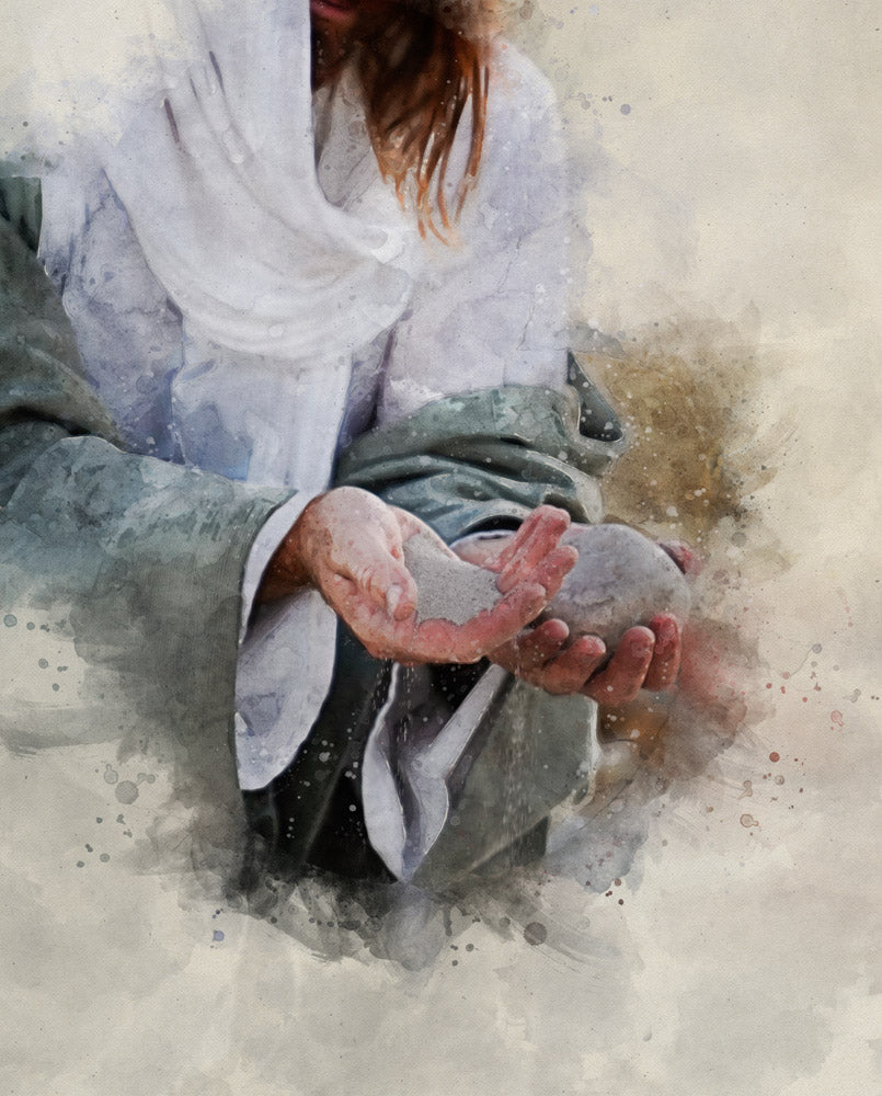 Jesus holding a stone in one hand and sand in the other.