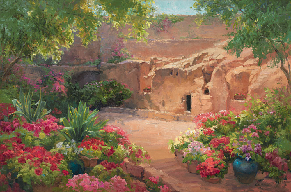 Empty tomb after Jesus had risen, surrounded by trees and flowers.
