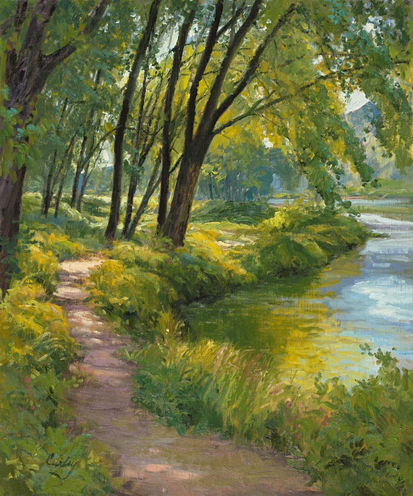 A small path and trees running alongside the Susquehanna river.