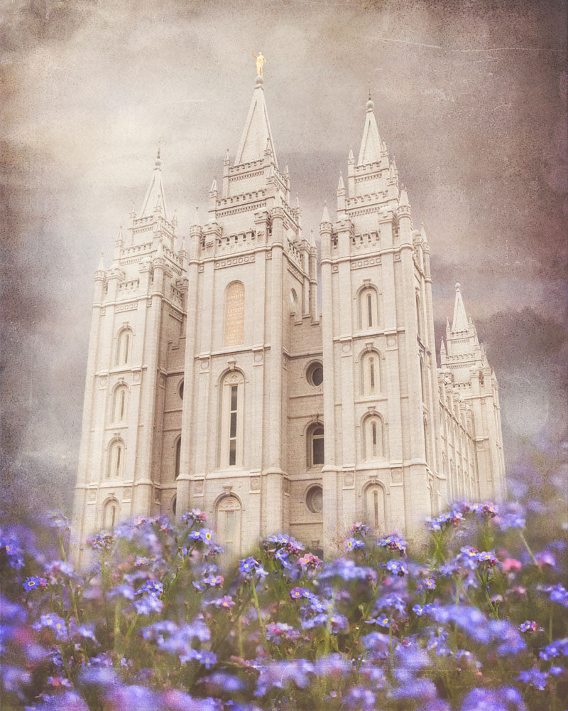 Salt Lake Utah Temple with purple flowers.