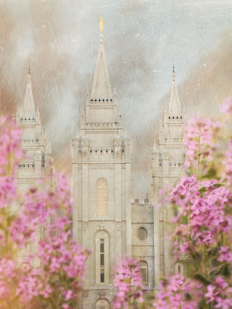 Salt Lake Utah Temple with pink blossoms.