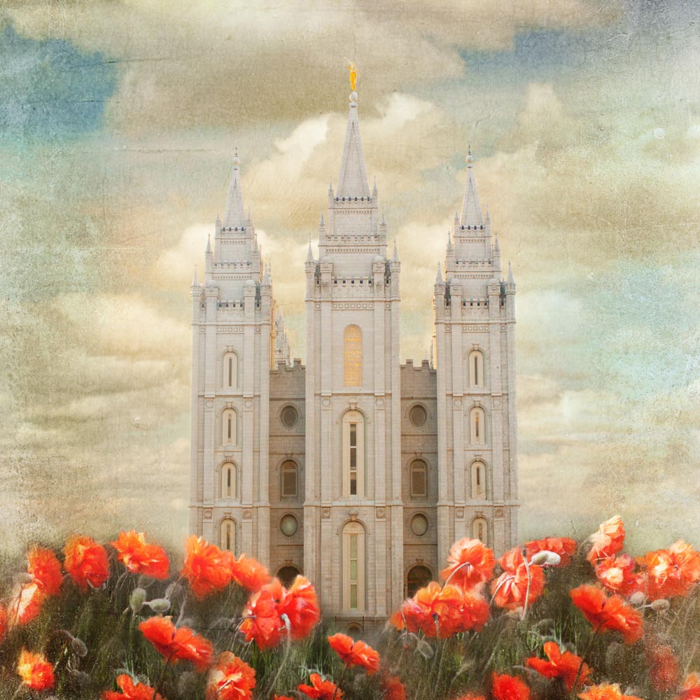 Salt Lake Utah Temple with red tulips in front.