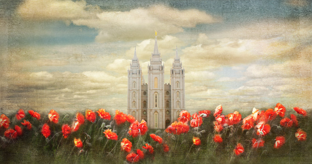 Salt Lake Utah Temple with red tulips in front panoramic.