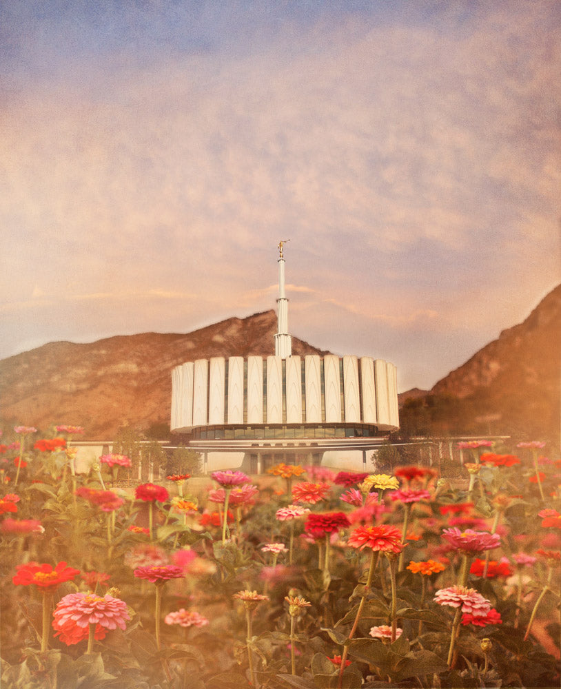 Provo Utah Temple with red flowers.