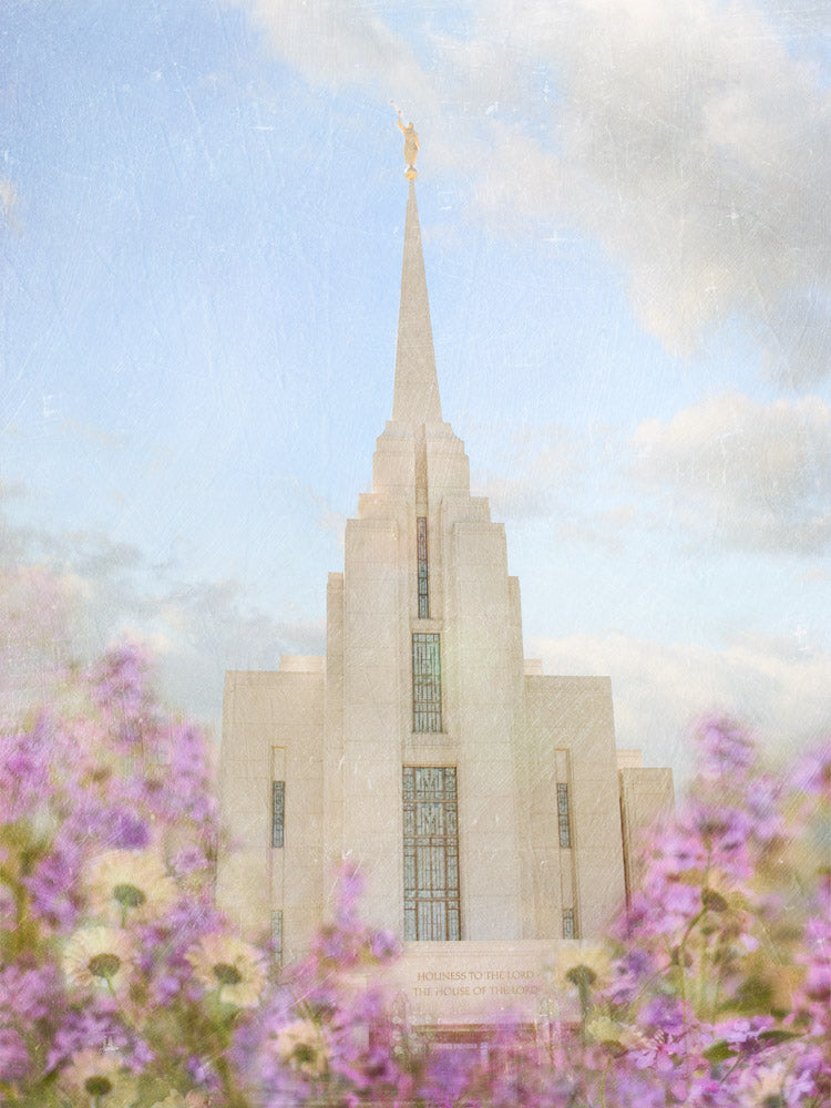 Rexburg Idaho Temple with purple flowers.