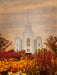 Brigham City Utah Temple with orange and red fall flowers. 