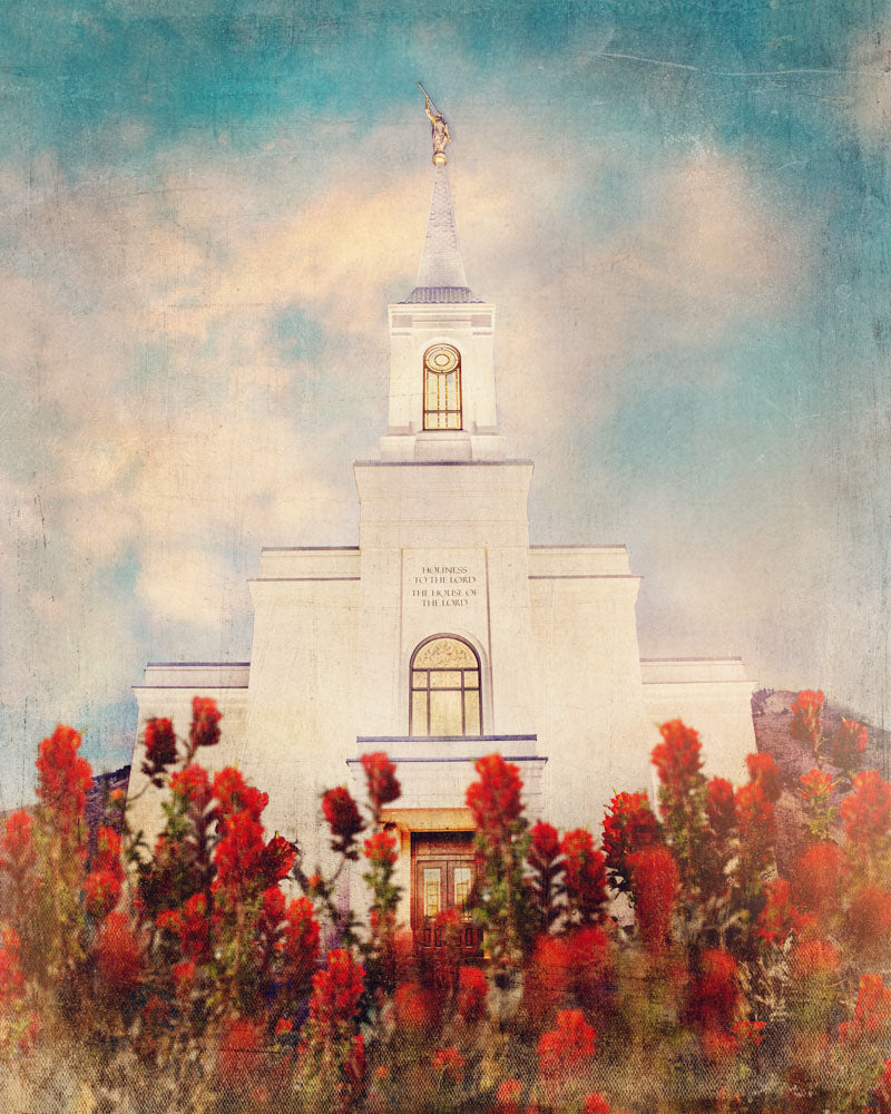 Star Valley Wyoming Temple with Red flowers.