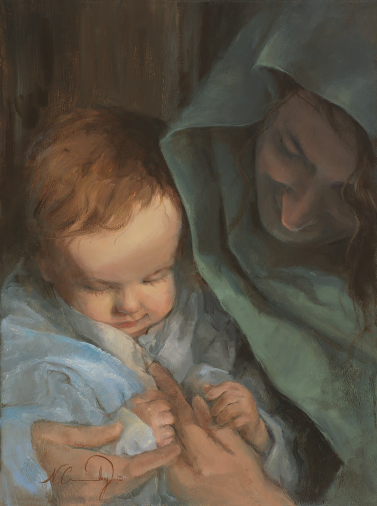 Mary holding baby Jesus.