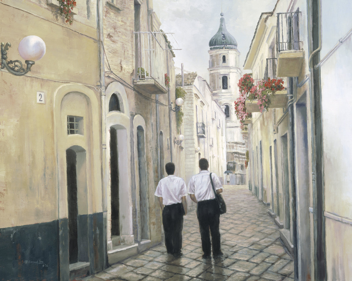 Two elder missionaries walking an empty European street.