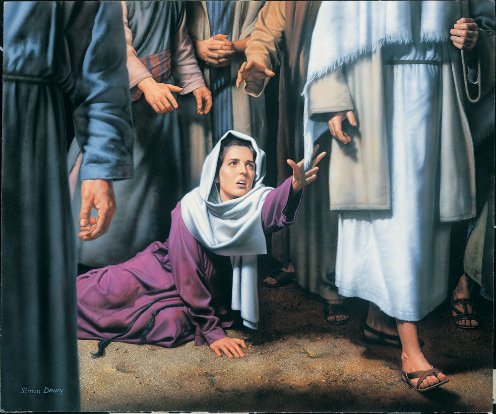Woman in the crowd reaches for the hem of Jesus' garment.