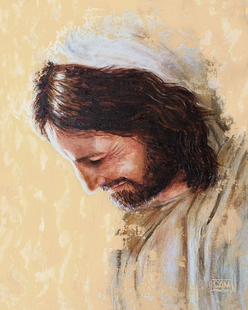 Portrait of Jesus looking downward. He is smiling and surrounded by light.