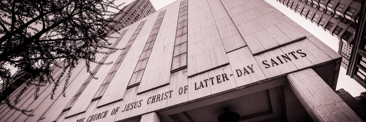 Angled, black-and-white photo of the Manhattan Temple by Scott Jarvie. Text reads: "10+ Stunning Palmyra & Manhattan New York Temple Pictures". 