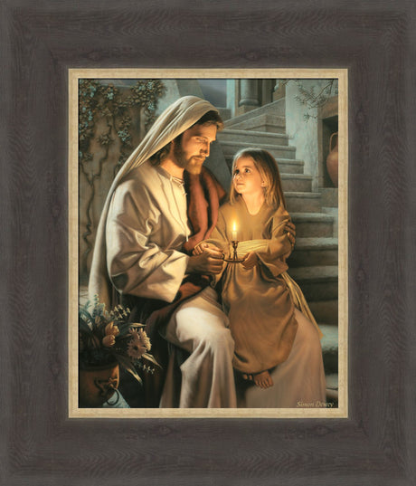 Jesus holding a girl and sharing a candle that is lighting their faces.