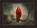 Jesus in a red robe walking along a path surrounded by pretty greenery.
