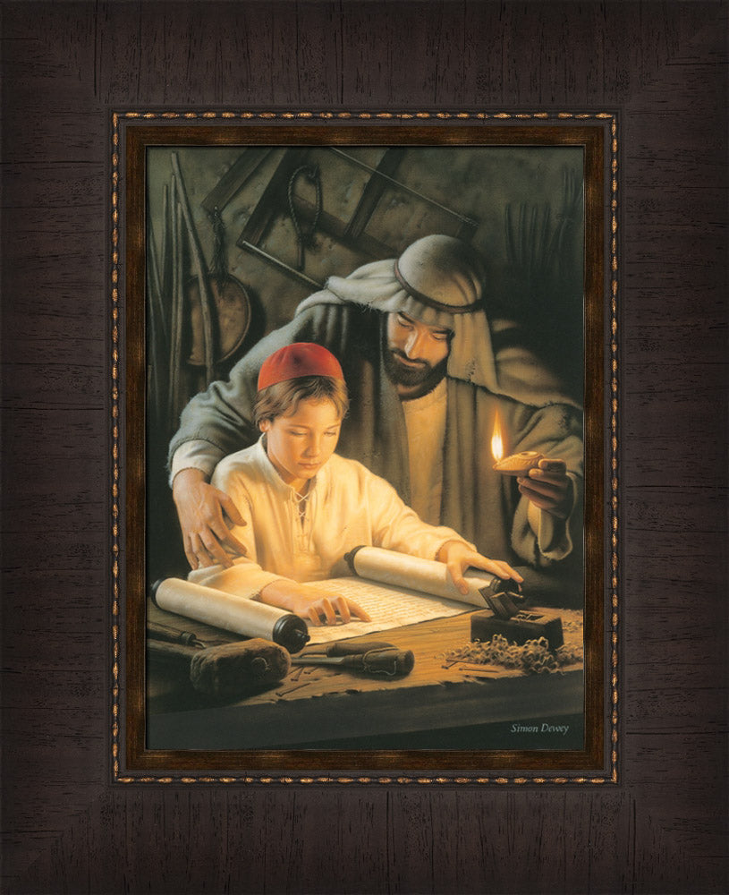 Joseph and the boy Jesus in the carpentry shop reading scripture.