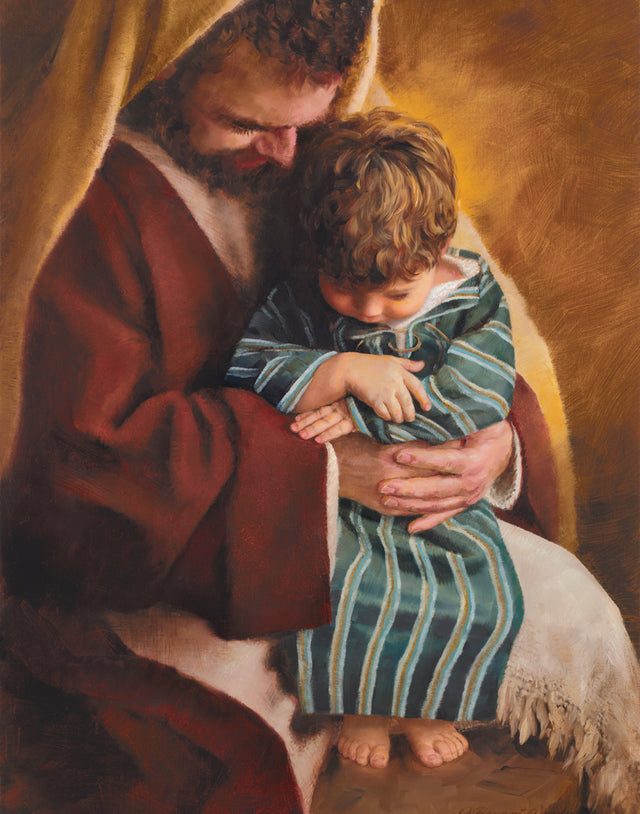 Joseph with Jesus on his lap teaching him about prayer