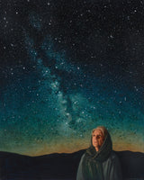 A woman looking up at the stars.
