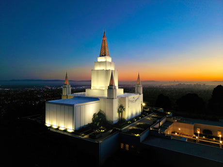 The Oakland California Temple with the sunset.