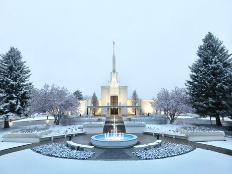 The Denver Colorado Temple with a snowy landscape.