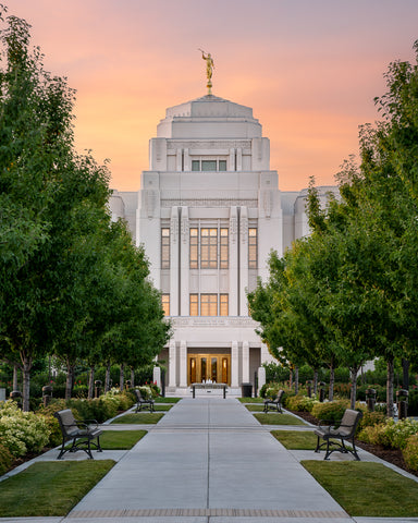 The Meridian Idaho Temple front path lined with trees.