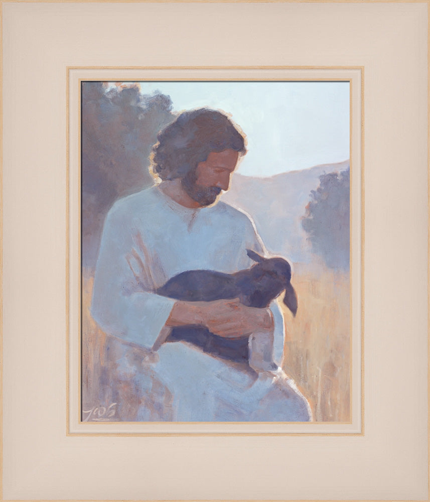 Jesus Christ holding a sheep.