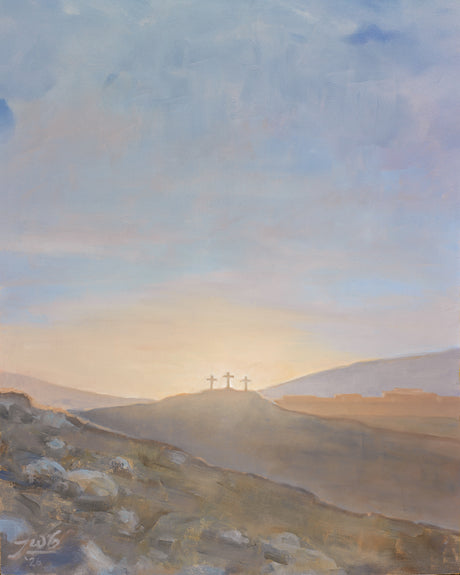 An arch shaped painting of three wooden crosses standing atop a rocky hill, backlit by a rising sun that spreads warm gold and pink light across the sky. In the foreground, scattered stones and dry grass lead the eye toward the hill, with distant mountains fading into soft haze.