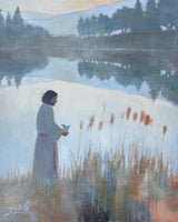 Painting of Christ standing by a still lake at dawn, gently holding a small bird in his hands, with tall cattails and reeds along the shoreline and a mirrored reflection of trees on the water.