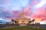 The Red Cliffs Utah Temple with pink clouds.