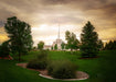 The Billings Montana temple with trees and a golden sky.