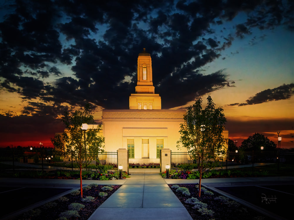 The Helena Montana Temple lit up in the evening.