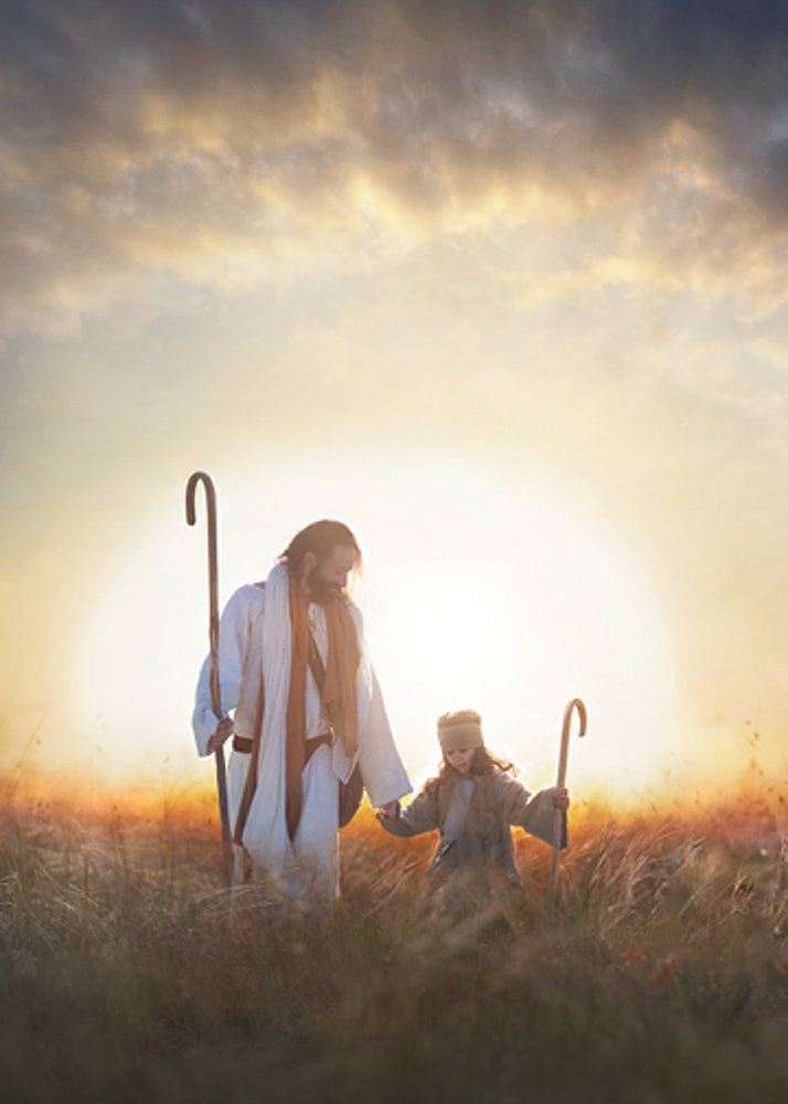 Jesus and a young shepherd holding hands walking in field. 