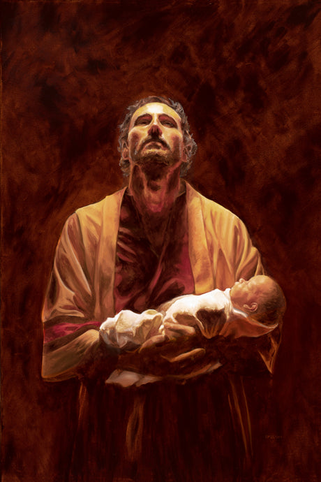 Jesus holding an infant in His arms. 