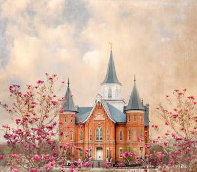 The Provo City Center Utah Temple with pink flowers.