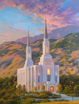 The Lindon Utah Temple with the mountains during sunset.