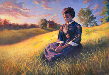 A pioneer woman prays in a field.
