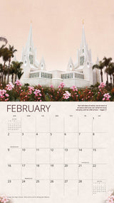 San Diego California Temple surrounded by blooming pink flowers and palm trees under a soft pastel sky.