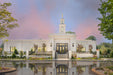 The Memphis Tennessee temple with a pink and blue sky.