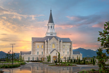 The Taylorsville Utah Temple with the sunset.