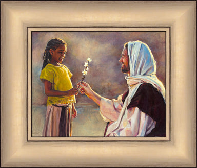 A little girl handing a flower to Jesus.