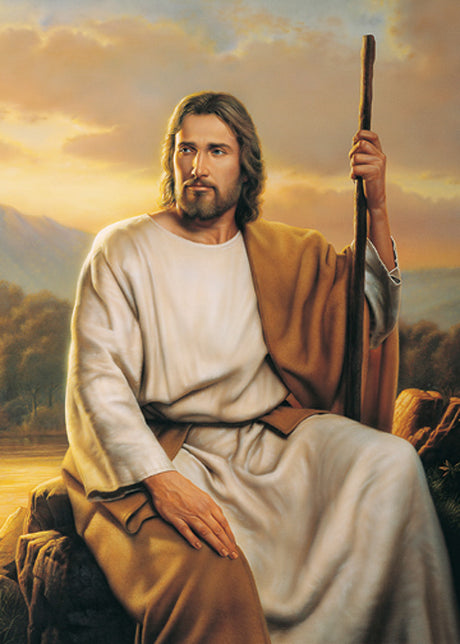 Christ seated on a rock holding a staff represents strength and compassion.
