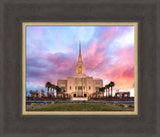 The Red Cliffs Utah Temple with pink clouds.
