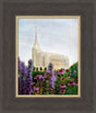 Rexburg Idaho Temple with purple flowers and blue sky.