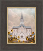 The Taylorsville Utah Temple with wild sunflowers.